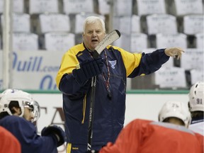 St. Louis Blues head coach Ken Hitchcock speaks to players during practice for Game 2 of the NHL hockey Stanley Cup Western Conference semifinals Saturday, April 30, 2016, in Dallas.