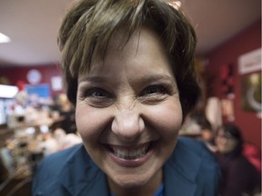 Liberal Leader Christy Clark hams it up for the camera during a campaign stop at a coffee shop in Qualicum Beach on Monday.