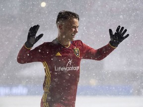 Real Salt Lake's Albert Rusnak celebrates a goal in the second half against the Whitecaps last Saturday, in snowy Sandy, Utah. Rusnak won the league's Player of the Week award after scoring a pair of goals in a snowstorm at home in Real Salt Lake's 3-0 victory over Vancouver.