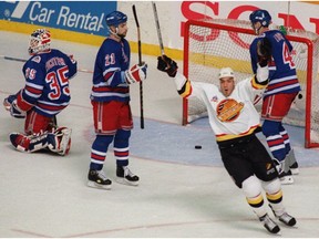 Geoff Courtnall of the Canucks celebrates after scoring against the New York Rangers during Game 5 of the 1994 Stanley Cup Final at the Pacific Coliseum in Vancouver.