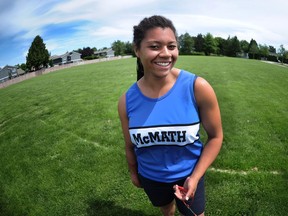 Camryn Rogers of R.A. McMath is adept at the hammer throw and more.