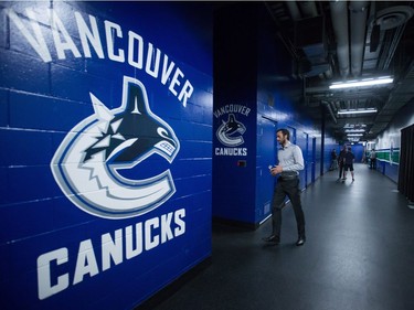 Vancouver Canucks' goalie Ryan Miller walks into the dressing room after an end of season news conference in Vancouver, B.C., on Tuesday April 11, 2017.