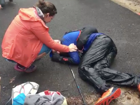 Gary Robbins collapses after finishing his run at the 2017 Barkley Marathons.