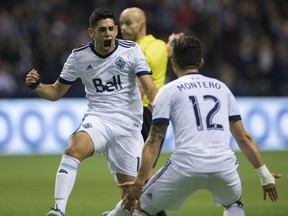 Matías Laba and Fredy Montero celebrate Laba's goal against the LA Galaxy during an April MLS game at B.C. Place.