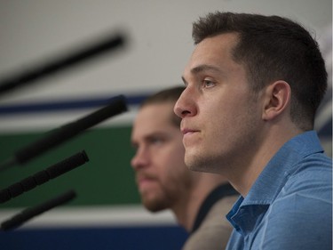 Vancouver, BC: April 11, 2017 -- Vancouver Canucks players face the media at Rogers Arena Tuesday, April 11, 2017. Pictured is (from left to right) Bo Horvat and Jacob Markstrom.