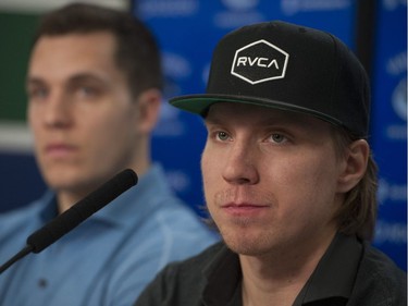 Vancouver, BC: April 11, 2017 -- Vancouver Canucks players face the media at Rogers Arena Tuesday, April 11, 2017. Pictured is (from left to right) Bo Horvat and Markus Granlund.