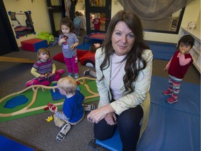 Sharon Gregson, spokeswoman for Child Care Advocates of B.C., an organization lobbying for $10-a-day daycare, with pre-school kids at the Collingwood Neighbourhood House in Vancouver.