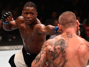 Will Brooks punches Ross Pearson during their lightweight bout at MGM Grand Garden Arena last July in Las Vegas, Nev.