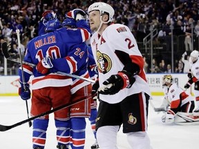 Ottawa Senators&#039; Dion Phaneuf (2) skates past as the New York Rangers celebrate a goal by Oscar Lindberg (24) against goalie Craig Anderson (41) during the second period of Game 3 of an NHL hockey Stanley Cup second-round playoff series Tuesday, May 2, 2017, in New York. (AP Photo/Frank Franklin II)