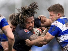 Siddal&#039;s Canaan Smithies, right, tackles Toronto Wolfpack&#039;s Fui Fui Moi Moi during the Ladbrokes Challenge Cup match at Siddal ARLFC, Halifax, England, Saturday Feb. 25, 2017. Brian Noble calls rugby league &ampquot;the NFL with MMA.&ampquot; &ampquot;I think it&#039;s the best game in the world,&ampquot; said Noble, a former Great Britain player and coach who now serves as the Toronto Wolfpack&#039;s director of rugby. THE CANADIAN PRESS/AP, Clint Hughes, PA