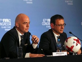 FIFA President Gianni Infantino, left, speaks during the FIFA Congress, in Manama, Bahrain, Thursday, May 11 2017. Addressing his second congress of soccer nations as FIFA president, Infantino lambasted &ampquot;fake news&ampquot; following criticism of his leadership. Infantino didn&#039;t cite any reports but it comes in the week ethics judge Hans-Joachim Eckert and FIFA prosecutor Cornel Borbely denounced the decision to remove them from their posts. (AP Photo)