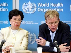 FILE - In this Tuesday, March 29, 2016 file photo, Margaret Chan, left, General Director of the World Health Organization (WHO) and Bruce Aylward, right, Executive Director of WHO and Health Emergencies Director-General&#039;s Special Representative for the Ebola Response, speak to the media after The International Health Regulations Emergency Committee on Ebola, during a press conference, at the WHO headquarters in Geneva, Switzerland. The World Health Organization routinely spends about $200 millio
