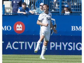 Vancouver Whitecaps midfielder Andrew Jacobson celebrates his goal against the Impact last Saturday in Montreal. Vancouver won the Major League Soccer match 2-1.