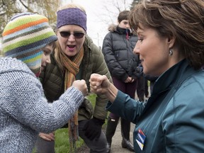 B.C. Liberal Leader Christy Clark gets a fist bump from a young boy during a campaign stop in Comox on April 17.