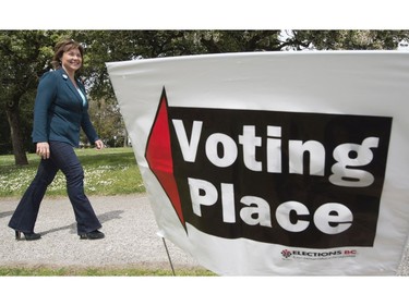 B.C. Liberal leader Christy Clark leaves a poling station after casting her ballot in Vancouver, B.C., Tuesday, May 9, 2017. The British Columbians head to the polls today.