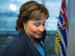 B.C. Premier Christy Clark leaves after a news conference in Vancouver, B.C., on Tuesday May 30, 2017.