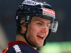 Philip Holm signed a one-year, two-way deal with the Canucks in May 2017.