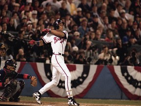 David Justice of the Atlanta Braves swings at a pitch during Game 2 of the 1995 World Series against the Cleveland Indians on Oct. 22, 1995 at Atlanta-Fulton County Stadium in Atlanta.