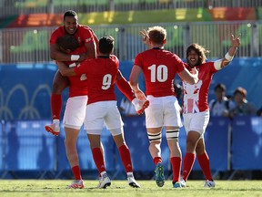 Team GB celebrates their rugby sevens semi final win over South Africa at the Rio Olympics.