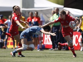 Team Canada's Hannah Darling avoids being tackled during rugby action against Team France at the HSBC Canada Women's Sevens at Westhills Stadium in Langford, B.C., on Saturday, May 27, 2017.