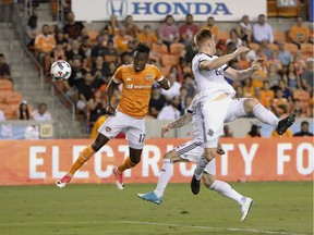 Houston Dynamo forward Alberth Elis escapes the coverage of Whitecaps defenders Tim Parker and Jordan Harvey to score the game's opening goal in their 2017 meeting.