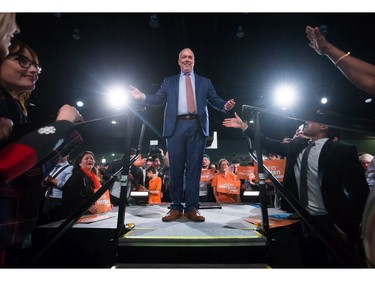 NDP Leader John Horgan leaves the stage after addressing supporters on election night.