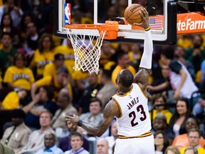 LeBron James dunks during the second half of Game One of the NBA Eastern Conference semifinals against the Toronto Raptors.