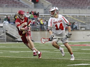 Tre Leclaire of Ohio State takes on Denver earlier in March in Columbus, Ohio.