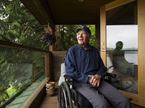 Wayne Norton sits on the deck at his home in Port Moody. Norton is a scout with the Seattle Mariners and member of the baseball Canadian hall of fame. He has ALS, and is in a wheelchair, but despite that, still scouts.