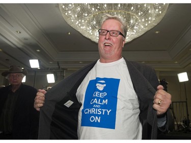 Liberals supporter Scott Lecy shows off his t-shirt at the at BC Liberal party HQ after the polls closed for the Provincial election, Vancouver, May 09 2017.