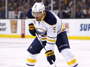 in this Feb. 6, 2016, file photo, Buffalo Sabres' Evander Kane prepares for a faceoff in the the first period of an NHL hockey game against the Boston Bruins in Boston.