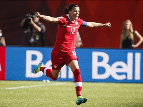 Canada's Christine Sinclair celebrates her game-winning stoppage-time penalty shot goal against China during FIFA Women's World Cup soccer action in Edmonton, Alta., Saturday, June 6, 2015.