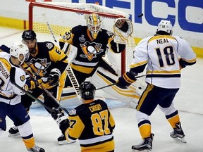 Pittsburgh Penguins goalie Matt Murray (30) turns away a Nashville Predators shot during the second period in Game 2 of the NHL hockey Stanley Cup Final, Wednesday, May 31, 2017, in Pittsburgh. (AP Photo/Gene J. Puskar)