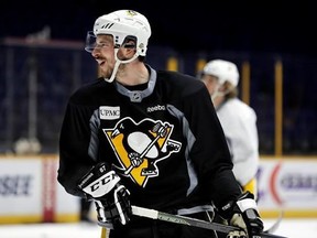 Pittsburgh Penguins center Sidney Crosby practices Sunday, June 4, 2017, in Nashville, Tenn. The Penguins and Nashville Predators are scheduled to play Game 4 in the NHL hockey Stanley Cup Finals Monday. The Penguins lead the series 2-1. (AP Photo/Mark Humphrey)