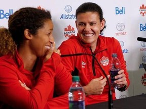 Team Canada soccer players Desiree Scott and Christine Sinclair joke around during a press conference in Winnipeg, Tuesday, June 6, 2017 prior to their match against Costa Rica on Thursday. Sinclair always has the spotlight on her, but the veteran captain says soccer fans should keep an eye on her young, talented teammates.THE CANADIAN PRESS/John Woods