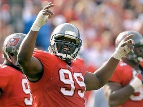 FILE - In this Jan. 12, 2003, file photo, Tampa Bay Buccaneers&#039; Warren Sapp tries to get the crowd going during the third quarter of the NFC divisional NFL football playoff game against the San Francisco 49ers in Tampa, Fla. Sapp is donating his brain for medical research. Sapp announced on social media Tuesday, June 20, 2017, that his brain will go to the Concussion Legacy Foundation after his death. The 44-year-old said in a statement that he&#039;s started to feel the effects of the many hits he t