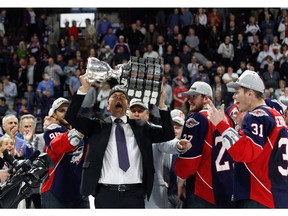 Coach Rocky Thompson of the Windsor Spitfires celebrates winning the Memorial Cup on May 28, 2017. The Canucks were interested in hiring Thompson in Utica, but the coach signed on with the expansion Las Vegas Golden Knights.