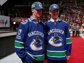New Canucks prospects Elias Pettersson (left) and Kole Lind at the NHL Entry Draft in Chicago.