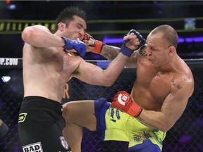 Chael Sonnen, left, trades blows with Wanderlei Silva, of Brazil, during a mixed martial arts bout at Bellator 180 last Saturday in New York. Sonnen won via unanimous decision.