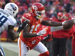 FILE - In this Dec. 18, 2016, file photo, Kansas City Chiefs wide receiver Jeremy Maclin (19) reaches for a first down next to Tennessee Titans linebacker Brian Orakpo (98) during an NFL football game in Kansas City, Mo. The Chiefs released Maclin in a stunning move Friday, June 2, midway through their voluntary workouts, bringing an abrupt ending to the tenure of what was arguably general manager John Dorsey and coach Andy Reid's biggest free-agent acquisition.