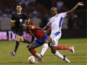 Panama's Adolfo Machado, right, fights for the ball with Costa Rica's Kendall Waston during a 2018 Russia World Cup qualifying soccer match at the National stadium in San Jose, Costa Rica, Thursday, June 8, 2017.