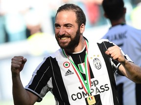 Juventus striker Gonzalo Higuain, shown celebrating after his club officially clinched Italy’s Serie A championship last month, has been brilliant this season heading into Saturday’s Champions League final.