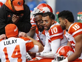 B.C. Lions quarterback Jonathon Jennings holds court with his teammates on the sidelines, an aspect of the game he'll need to expand upon if he's to be an elite quarterback.