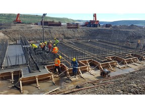 Workers pour concrete at the Site C dam construction project on the Peace River. Employers say B.C. faces a critical skilled-labour shortage.