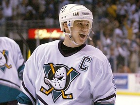 Paul Kariya celebrates a goal with the Anaheim Mighty Ducks in May 2003. The recently inducted Hockey Hall of Fame member was forced from the game due to concussions, and says the league is moving in the "right direction" addressing the issue.