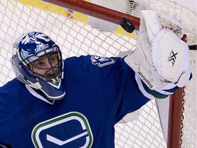 Roberto Luongo makes a save against the Chicago Blackhawks in January 2014 before being traded to Florida by the Vancouver Canucks.