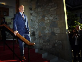 NDP leader and Premier-designate John Horgan makes a brief statement and answers questions from the media after meeting with Lt.-Gov. Judith Guichon at the Government House in Victoria, B.C., on Thursday, June 29, 2017.