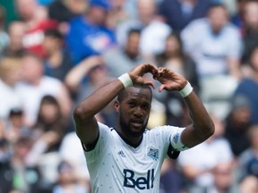 Vancouver Whitecaps' Kendall Waston celebrates his second goal against Atlanta United during the first half of an MLS soccer game in Vancouver, B.C., on Saturday June 3, 2017.