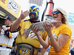 A Nashville Predators fan holds a catfish prior to Game Three of the 2017 NHL Stanley Cup Final between the Pittsburgh Penguins and the Nashville Predators at the Bridgestone Arena on June 3, 2017 in Nashville, Tennessee.
