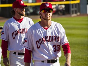 White Rock's Brayden Bouchey, right, patrols the outfield before his Vancouver Canadians faced the Everett AquaSox in the C's' home-opener Tuesday.